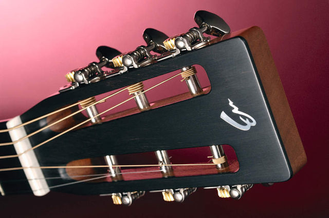 The 000R's slot headstock with open geared tuners. The 000R's slot headstock with open geared tuners.